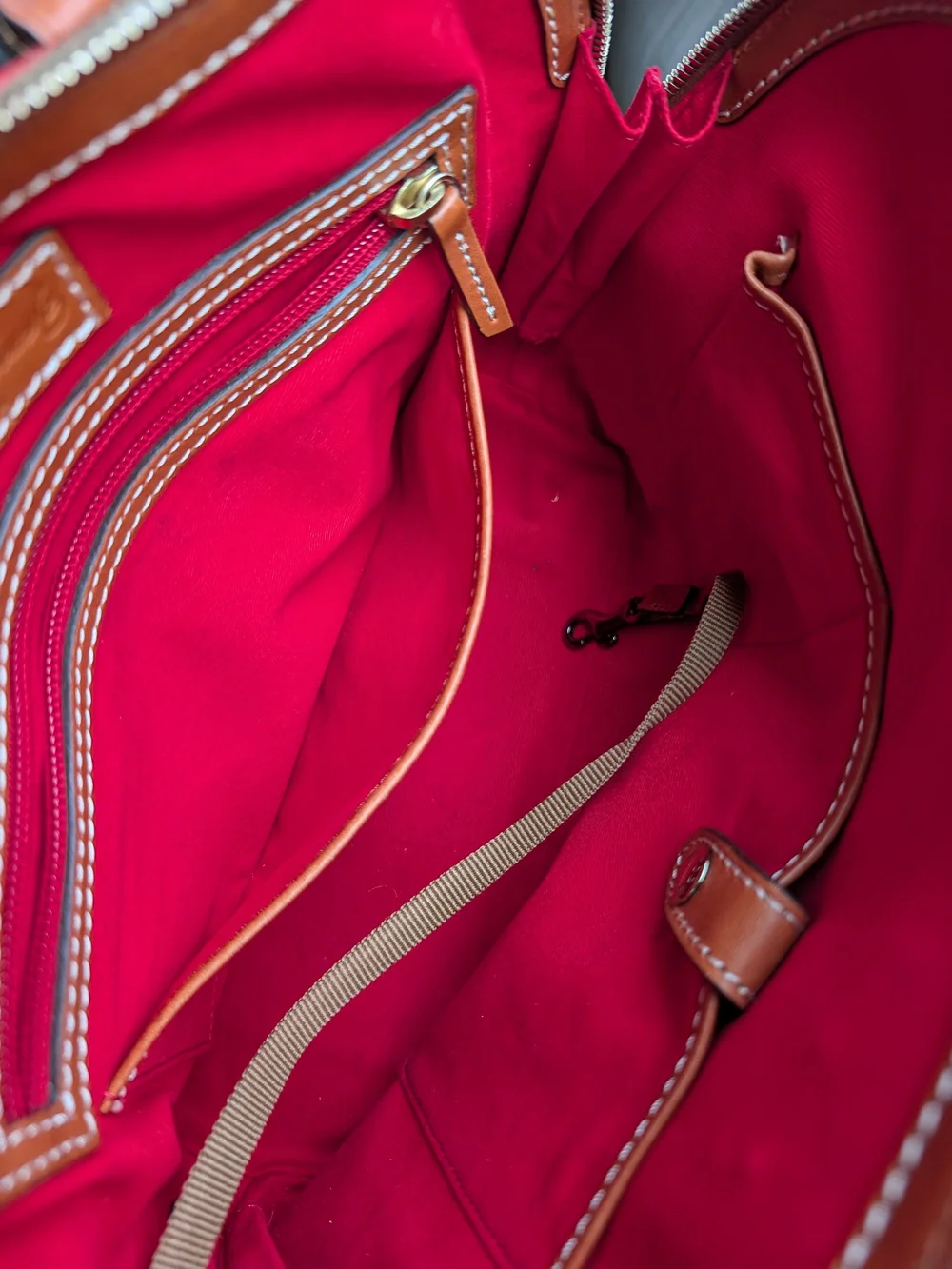 Dooney & Bourke Red Pebbled Leather Satchel with Tan Trim.Used In Great Conditio
